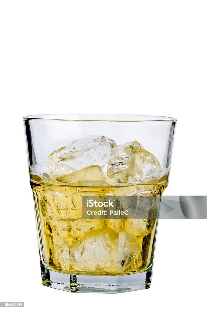 Glass of whiskey on the rocks isolated on white background Whisky in lowball glass with ice cubes isolated on white background Alcohol - Drink Stock Photo