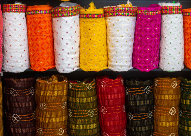 istock Colorful indian female cloths stack in wholesale shop 1543210607