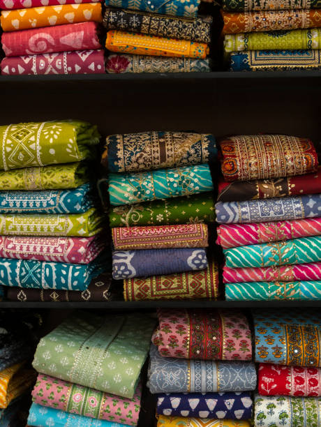 istock Colorful indian female cloths stack in wholesale shop 1543211131