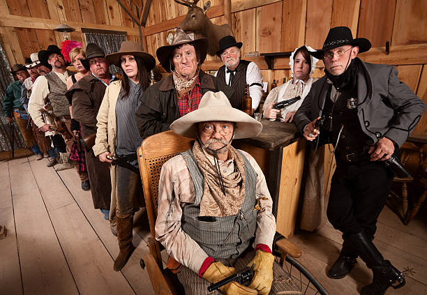 istock Serious Group of People in Old West Tavern 154321831