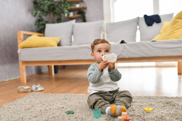 Drinks And Toys For Cute Small Baby