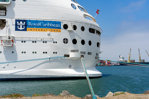 Ensenada, BC, Mexico – June 4, 2023: The stern side of Royal Caribbean’s Navigator of the Seas cruise ship docked in the Port of Ensenada, Baja California Mexico.