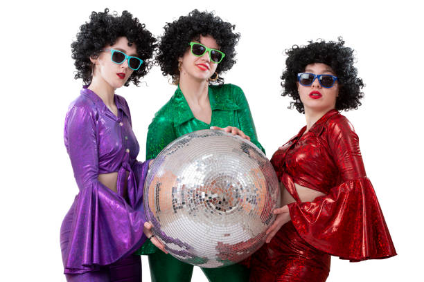 istock Three girls with a disco ball 1543329102