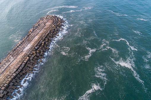 The breakwaters and harbor pier. Aerial view from drone.