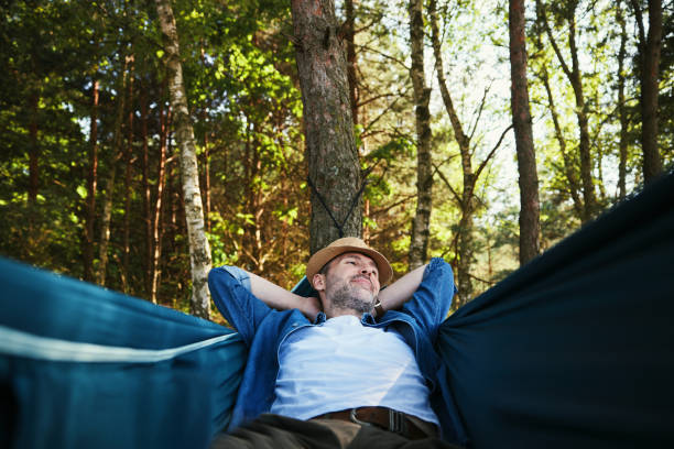 istock Adult man chilling in hammock in a forst during summer vacation 1543436749