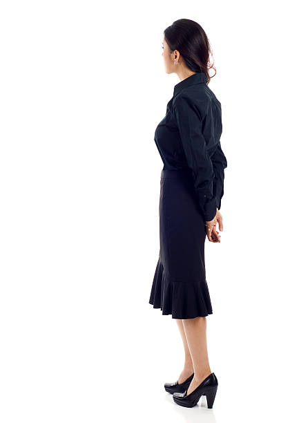 asiatische frau rücken - businesswoman skirt isolated standing stock-fotos und bilder