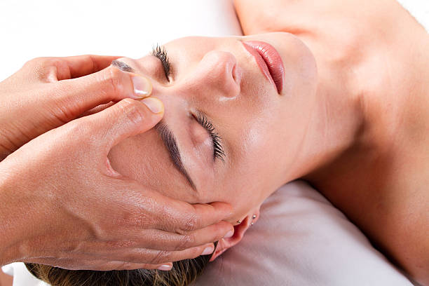 istock Acupressure with thumbs on forehead 154348609
