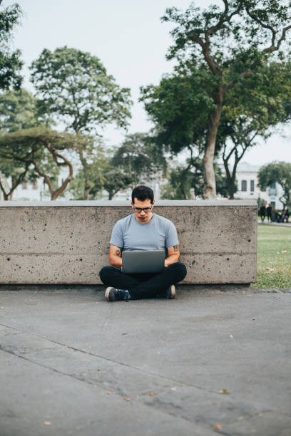 istock Man paying with his credit card on a laptop. 1543518629