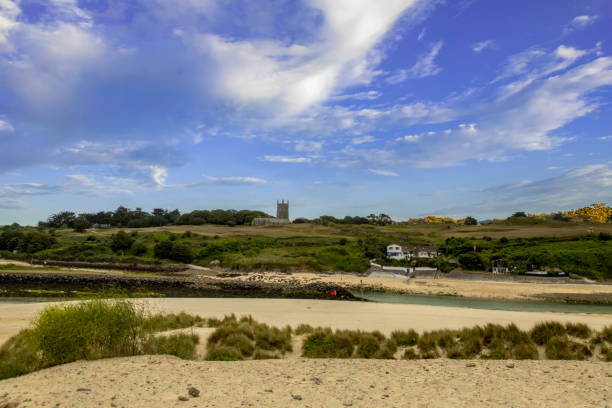 istock St Uny's Church overlooking the Hayle Estuary in Cornwall, UK 1543518731