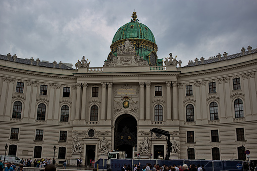 Vienna, Austria - June 27, 2023: Entrance to the Hofburg Imperial Palace in Vienna, Michaelertor. Hofburg palace on St. Michael square (Michaelerplatz). Popular tourist attraction.