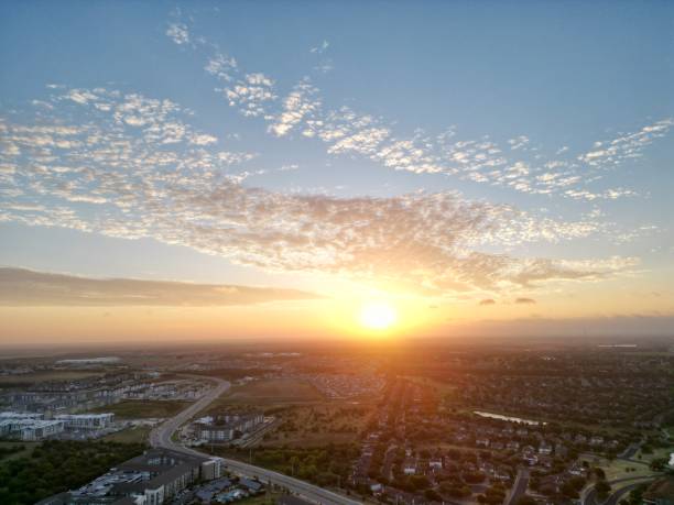 Orange sunrise over the suburbs.