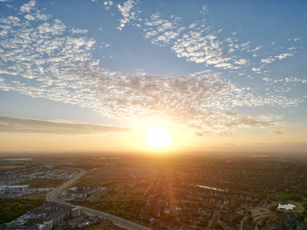 istock Orange sunrise over the suburbs. 1543543868