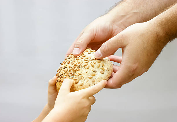 Partilha do pão - fotografia de stock