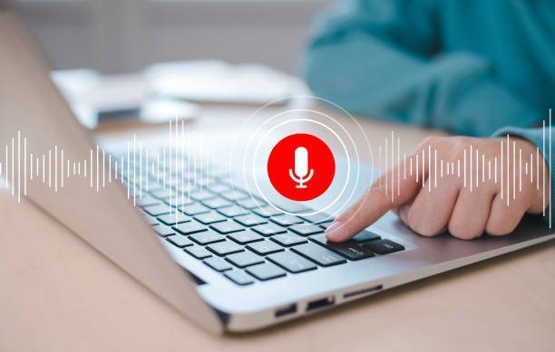 istock Businessman using smartphone touch microphone button on virtual screen. Blog blog speak talk advertising presentation,Voice recognition, speech detection and deep learning application,Voice Assistance 1543544919