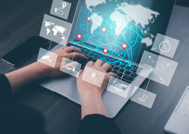 istock Man using Smartphone with virtual world and model map with location point, GPS app, icon Travel maps and find places in the online system, all screen graphics are generated, Searching for travel. 1543544925
