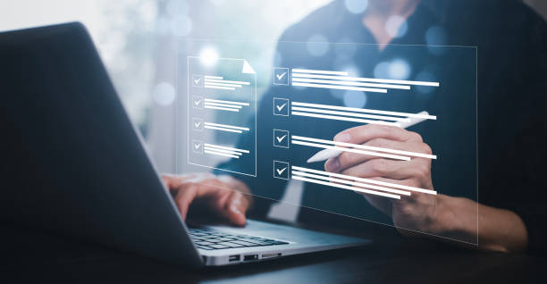 istock checklist and clipboard task documentation management, business people working laptop checklist questionnaire assessment form, online survey online exam Choosing the right answer in the exam 1543545630