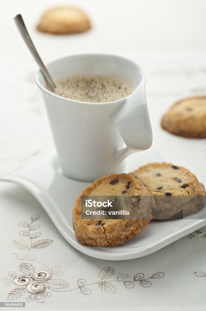 Chocolate chip vanilla cookies Chocolate chip vanilla cookies with a cup of coffee Baked Stock Photo