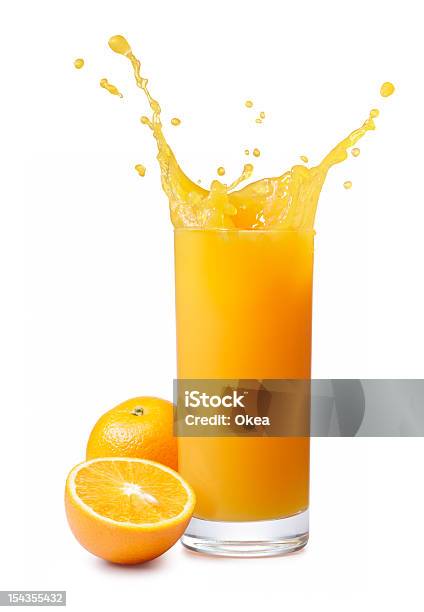 Jugo De Naranja Salpicaduras Foto de stock y más banco de imágenes de Zumo - Zumo, Fondo blanco, Salpicar