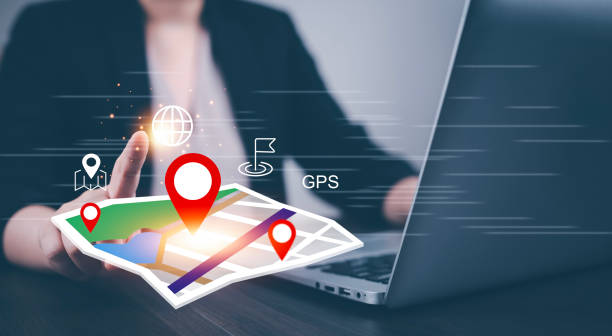 istock Woman using Smartphone with virtual world and model map with location point, GPS app, icon Travel maps and find places in the online system, all screen graphics are generated, Searching for travel. 1543594859