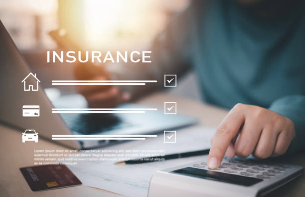 istock Online Insurance form agreements concept, Business people using laptops with E-mail insurance contract e-signing digital online, document management, concerning mortgage loan offer for house insurance 1543597955