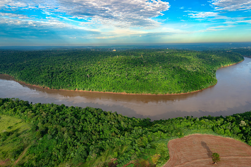 Aerial view of the Iguazu River on the triple border of Brazil, Argentina and Paraguay.