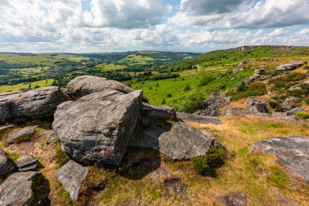 istock Boulders in foreground: Green landscape in background 1543605492
