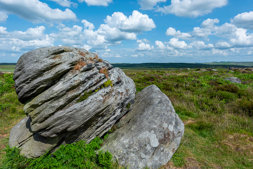 Boulder in focus, located in the Peak District, Derbyshire, England