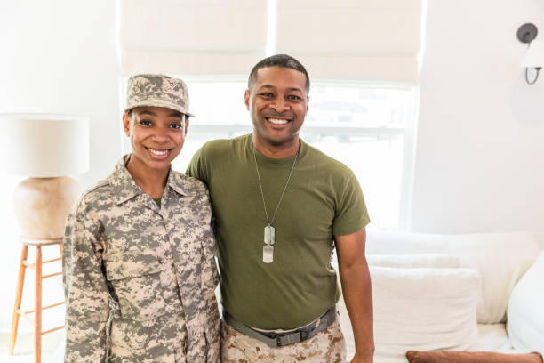 istock Soldier daughter poses with military dad 1543681021