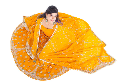 overhead view of Indian woman in traditional clothing sari