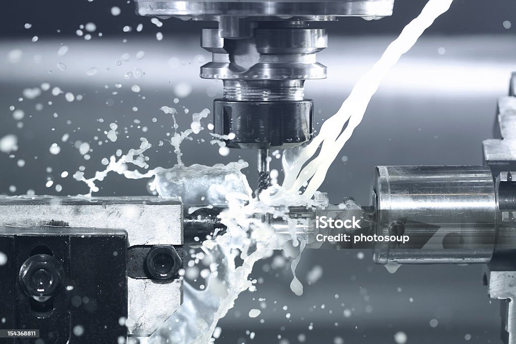 CNC milling at work Close up of CNC machine processing CNC Machine Stock Photo