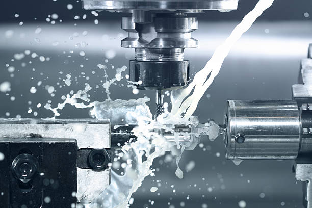 CNC milling at work Close up of CNC machine processing machinery stock pictures, royalty-free photos & images