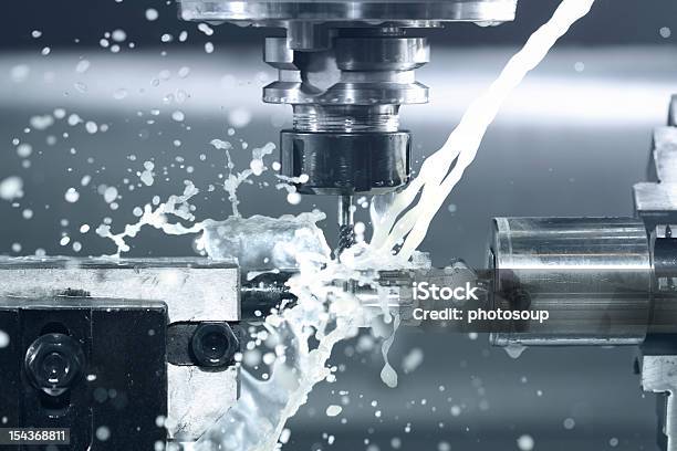 Cnc Milling At Work Stock Photo - Download Image Now - CNC Machine, Machinery, Industry