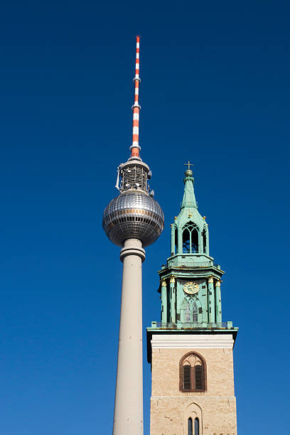 istock Berlin TV Tower and Marienkirche at blue sky 154369111