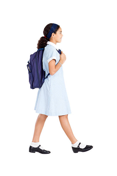 istock schoolgirl going to school 154370795