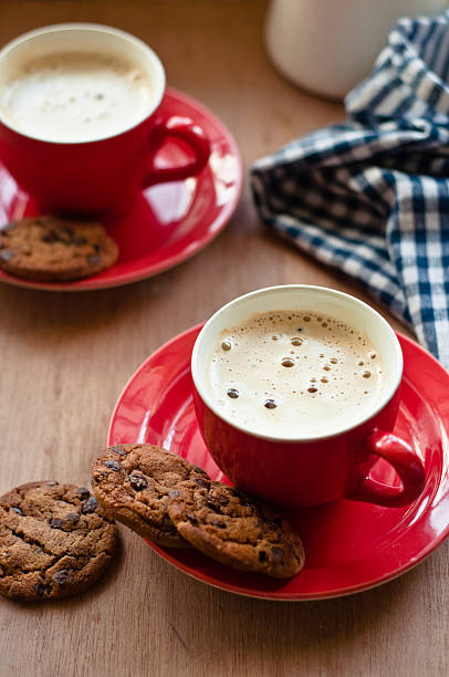 istock Coffee in red cups with chocolate chip cookies 154372893