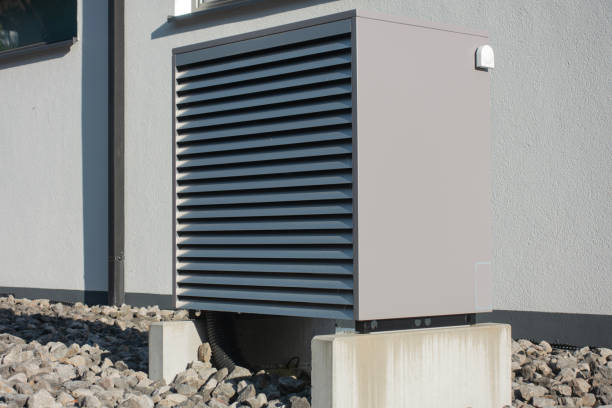 heat pump in a new building area with modern house facades stock photo