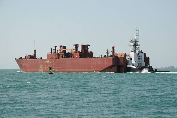 istock Notch Barge and Tugboat 154379395