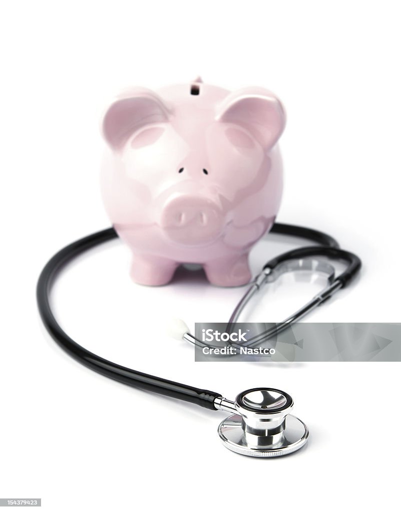 Piggy bank and stethoscope Piggy bank and stethoscope isolated on white background Stethoscope Stock Photo