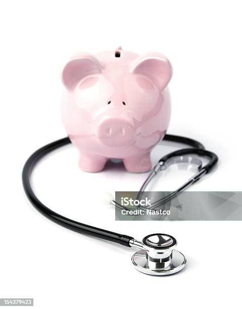 Piggy Bank And Stethoscope Stock Photo - Download Image Now - Stethoscope, Coin Bank, Healthcare And Medicine