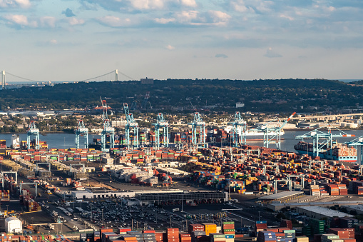 9/27/2022 - Port of Newark, Newark, New Jersey, USA - Aerial view of Shipping Containers, Newark Bay, Panamax cranes, and the Port of Newark - Elizabeth Marine Terminal run by the Port Authority of Newark and New Jersey