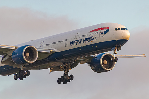 London, UK - May 29, 2023: Boeing 777 British Airways approaching early morning to London Heathrow Airport.