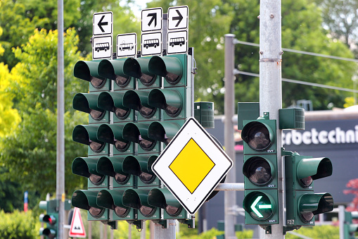 Chemnitz, Germany - July 9, 2023: Many traffic lights on a crossroad with tram lines in Chemnitz, Saxony