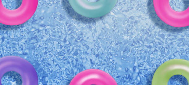 istock Colorful Inflatable Round Tube Floating In A Beautiful Pool 1543903873