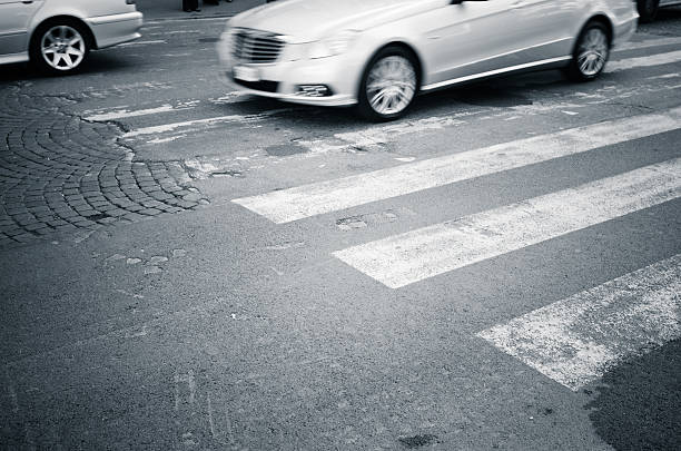 istock Car on Pedestrian line crossing street 154391143