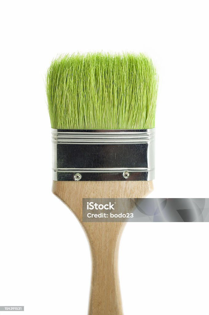 Paint brush with green grass Paint brush with dull green color isolated on white' Greenwashing Stock Photo