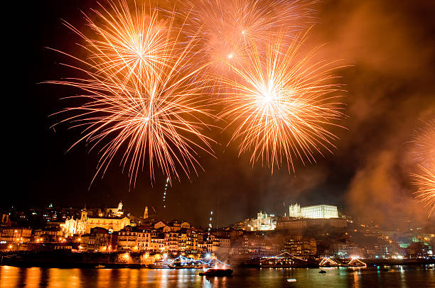Amber fireworks over the harbour on St. John's night stock photo