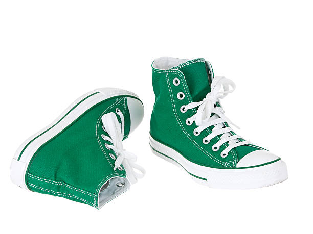 Vintage canvas green shoes stock photo