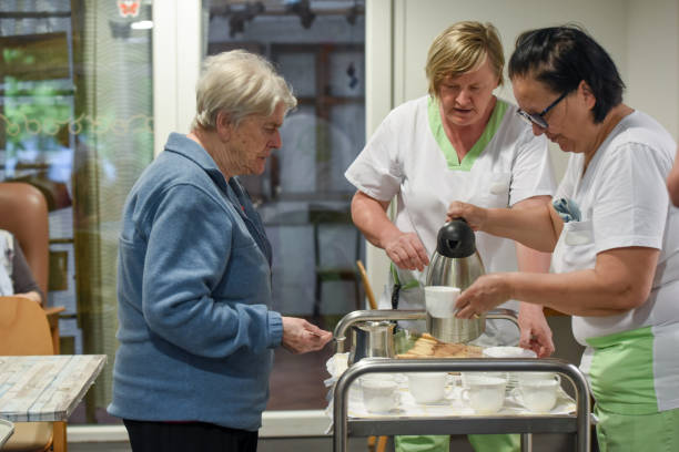 istock Serving a morning coffee in a Nursing home 1543966334