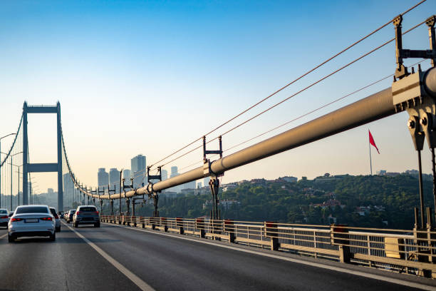 istock Cars on bridge to sunny day 1543966341