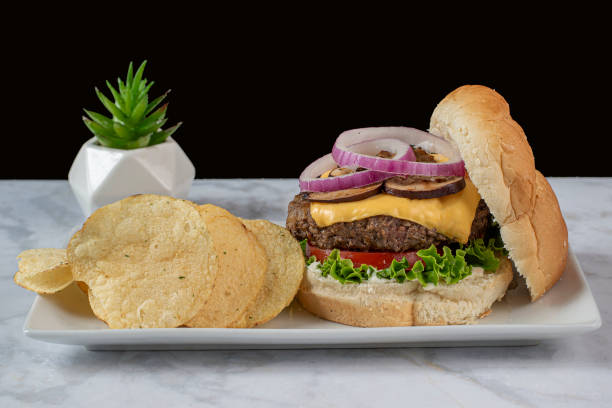 istock cheese burger  top with onions and mushrooms 1543967900